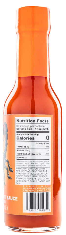 Bottle of Fred's Hot Sauce 'The Sting' with nutrition facts and ingredients on the label.