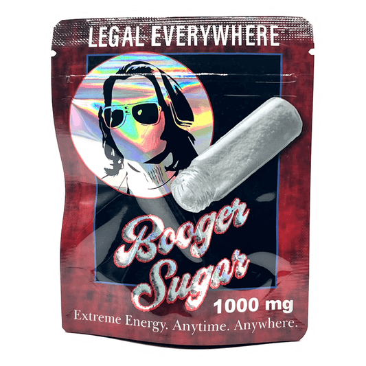 A vibrant package called Legal Booger Sugar, 1g by Vegas Party Favors has the tagline Extreme Energy. Anytime. Anywhere. with a stylized person in sunglasses and a large pill icon, featuring Legal Everywhere at the top for an energy boost of 1000 mg.