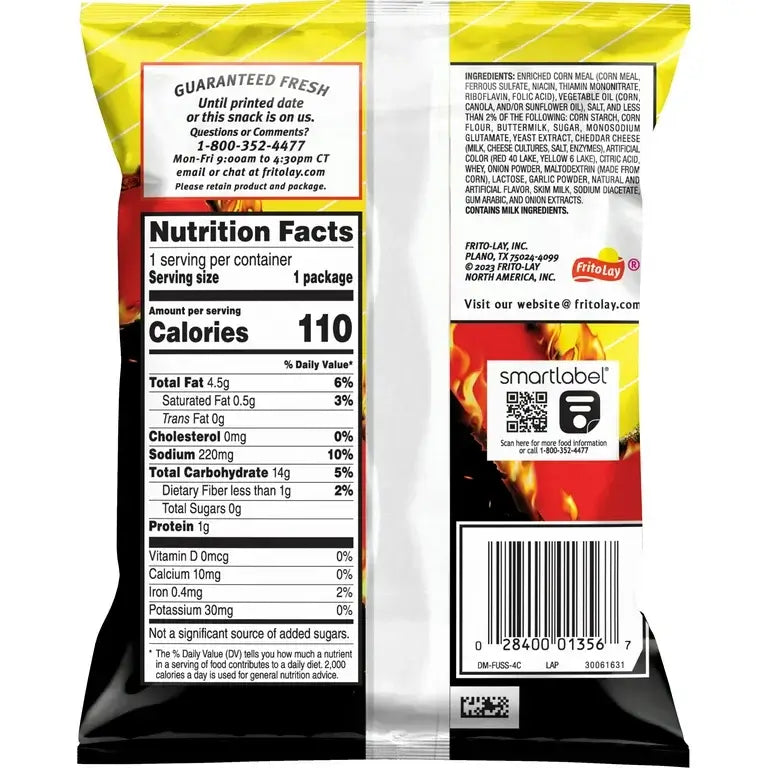 The back of a Funyuns Flamin Hot Onion Rings 0.75 oz snack bag shows a nutrition facts label detailing total fat, sodium, and carbs. A guarantee message, barcode, Frito-Lay branding, Vegas Party Favors brand name, and a smart label QR code are also visible.