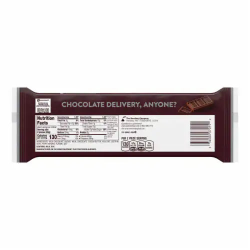 The back of a Hershey Candy Bar Milk Chocolate 1.55 oz wrapper by Vegas Party Favors includes nutritional info and a barcode, topped with the cheerful text CHOCOLATE DELIVERY, ANYONE?.