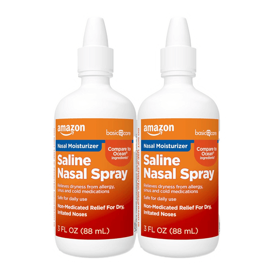 Two 3 fl oz bottles of Vegas Party Favors Saline Nasal Moisturizing Spray are displayed, featuring orange labels that detail their non-medicated, instantly soothing mist for allergy and cold-related dryness relief.