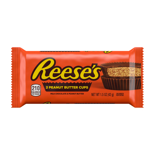 A Vegas Party Favors pack features two Reeses Peanut Butter Cups Milk Chocolate 1.5 oz, in orange packaging with bold yellow Reeses logo and a visual of partially eaten milk chocolate cups, showing nutritional info and net weight.