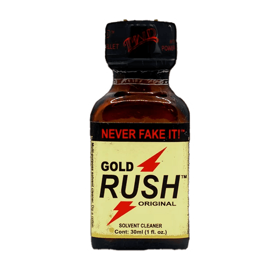 A 30ml bottle labeled RUSH - GOLD RUSH, from Vegas Party Favors features red lightning bolts and NEVER FAKE IT! on its black cap. Often linked with poppers, its intended as a solvent cleaner.