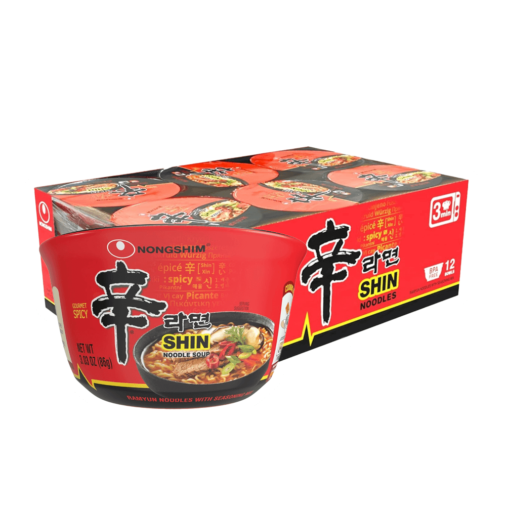 A box of Nongshim Gourmet Spicy Shin Noodle Soup Bowl from Vegas Party Favors includes 12 packs, each 3.03 oz (86g). The red packaging features a noodle bowl image and bold black and white Korean text, promising an authentic spicy instant noodles experience.