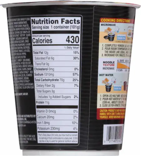 The Nongshim Black Shin Noodle Cup by Vegas Party Favors features chewy noodles, vegetables, and beef chunks. It displays nutrition facts on the side with 430 calories per serving. Cooking directions for both microwave and hot water methods are included on the packaging.