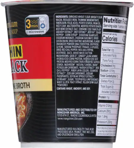 The Nongshim Black Shin Noodle Cup by Vegas Party Favors features a red and black label with cooking instructions, ingredients like rich pork bone broth, nutrition facts, calories, chewy noodles, vegetables, and beef chunks for a satisfying meal.