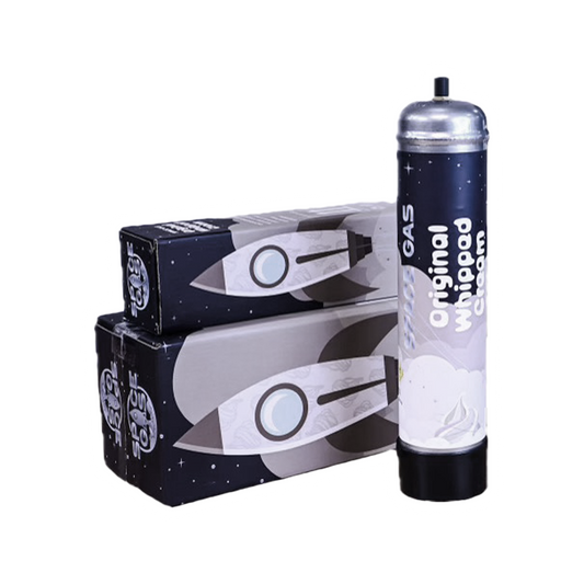 The Space Gas Whipped Cream Charger 1.1L by Vegas Party Favors stands beside two boxes with a rocket design, ready to elevate your culinary creations.
.