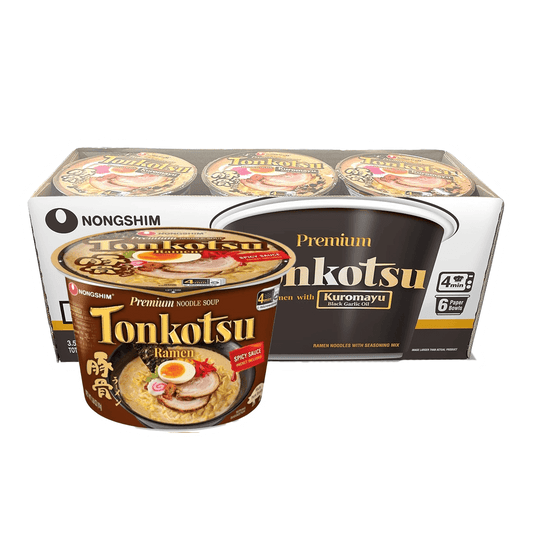 The image features Vegas Party Favors Tonkotsu Spicy Sauce Ramen Bowl, showcasing its versatile ramen with slices of meat and eggs. The packaging includes multiple large bowls emphasizing Kuromayu seasoning.