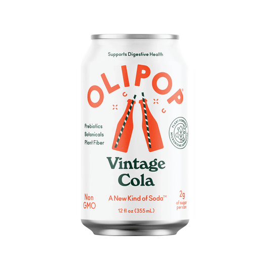 A 12 fl oz OliPop Soda can, by Vegas Party Favors, in Vintage Cola flavor boasts a retro design. It highlights Supports Digestive Health, Non-GMO, and 2g of sugar per can, featuring prebiotics, botanicals, and plant fiber.