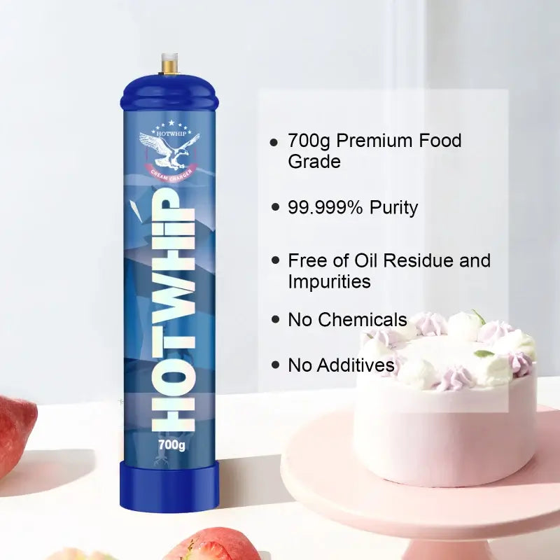 A blue 1.1L canister labeled Vegas Party Favors sits beside a small white cake topped with whipped cream. This premium whipped cream charger offers 700g of food-grade nitrous oxide with 99.999% purity, free from residue or additives—perfect for culinary perfectionists.